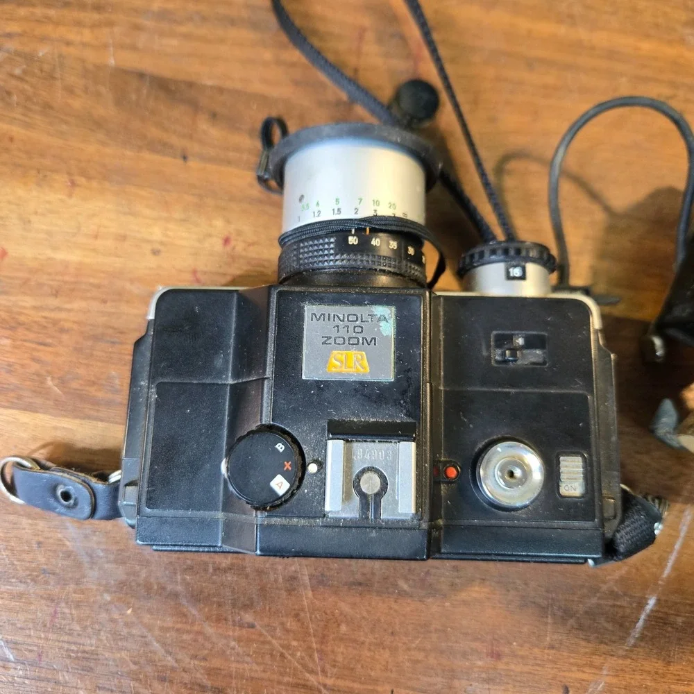 Vintage Minolta 110 Zoom SLR Camera & flash Untested